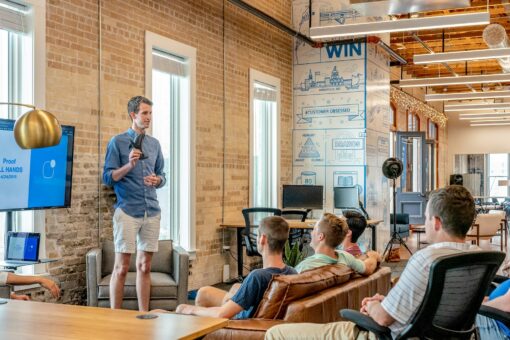 Business consultant presenting to a team