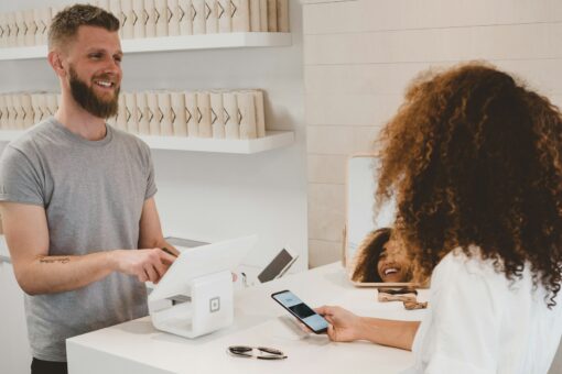 Customer paying with a card reader